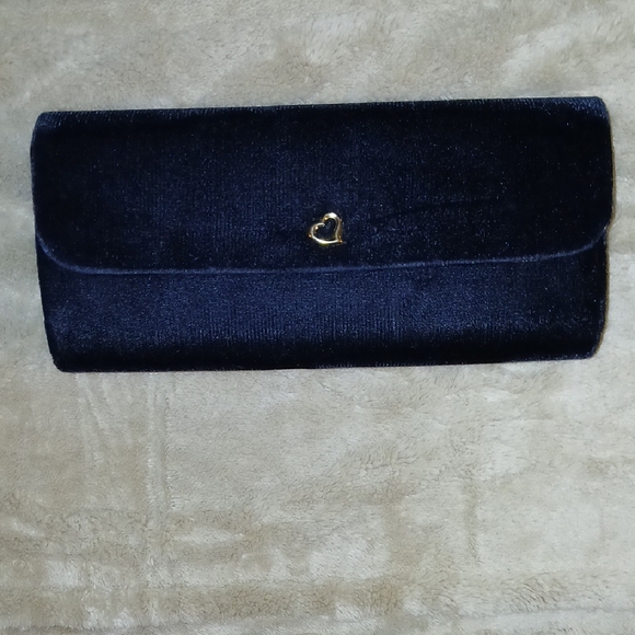 Victoria's Secret Handbags - Elegant Black Clutch with Gold Heart Accent